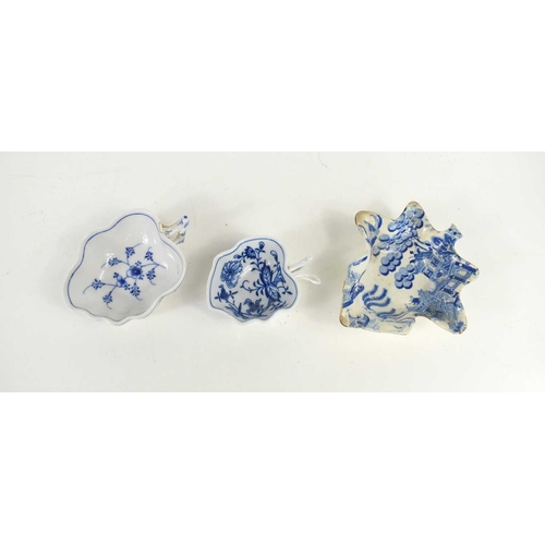 364 - Two 18th century blue and white pickle dishes of leaf form together with a later example.