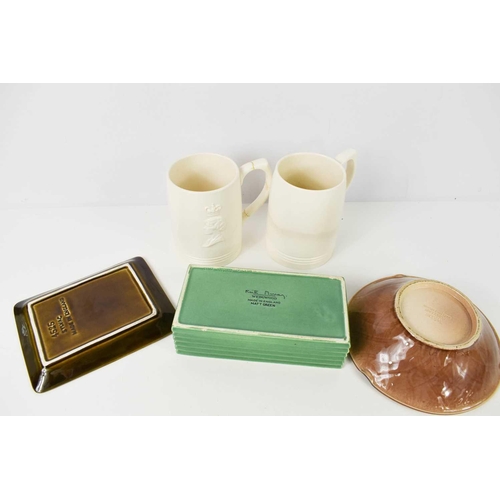 380 - A group of ceramics to include Wade porcelain tortoise ashtray, Wedgwood commemorative mugs, Keith M... 