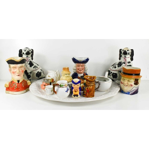 389 - A group of Victorian and later pottery to include character jugs, Crestware, Royal Worcester miniatu... 