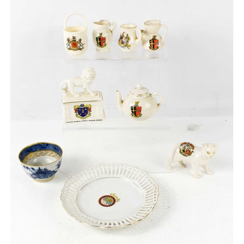 389 - A group of Victorian and later pottery to include character jugs, Crestware, Royal Worcester miniatu... 