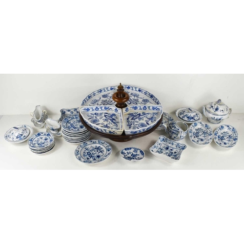 393 - A miniature pottery blue and white part dinner service comprising tureens & covers, sauce boats, bow... 