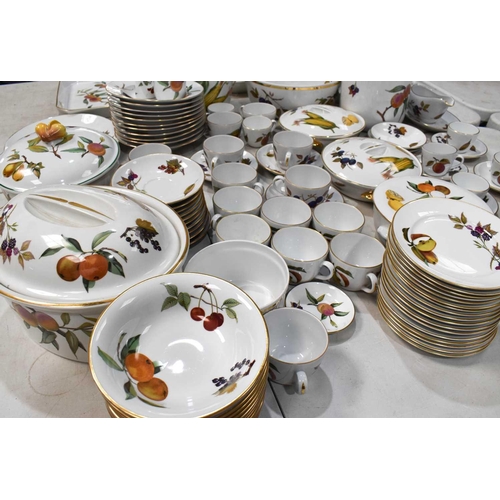 426 - A Royal Worcester part dinner service in the Evesham pattern comprising, twelve dinner plates and la... 