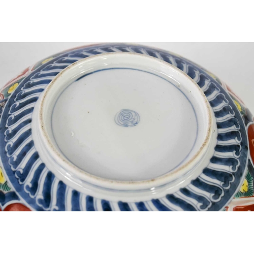 434 - A 19th century Japanese Imari style bowl, decorated inside and out, and bearing blue mark to the bas... 