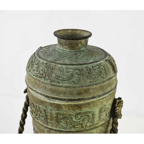 435 - A Chinese archaistic vessel and cover, with rope twist handle and cast with decoration to the body a... 