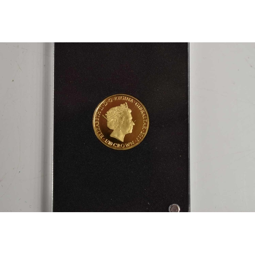44 - A Queen Elizabeth II 1/10th gold crown, sealed in a plastic capsule.