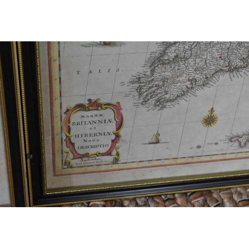 479 - A map of Devon, 67 by 53cm, and another of The British Isles, 43 by 54cm, both framed and glazed. (2... 