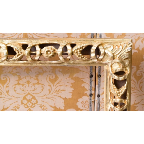 489 - A pair of modern giltwood carved and pierced frames, in the 17th century style, 111 by 85cm.