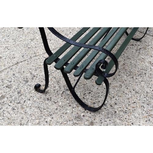 540 - A wrought iron railway station bench of large proportions, the back board stamped L&NWR Co for Londo... 