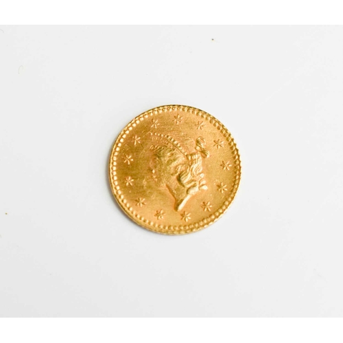 67 - A USA gold dollar dated 1853.