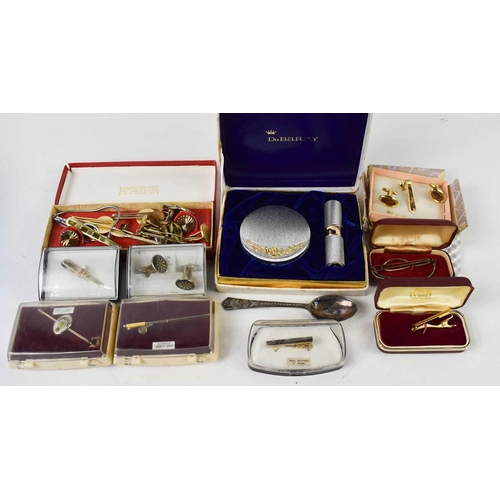 81 - A group of cuff links, mostly gold plated examples, in original boxes, a DuBarry boxed compact and l... 