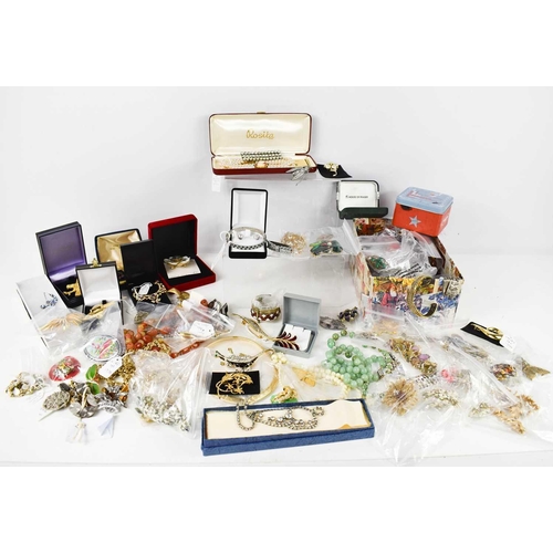 83 - A large selection of vintage and later jewellery including silver examples, jade beaded necklaces, p... 