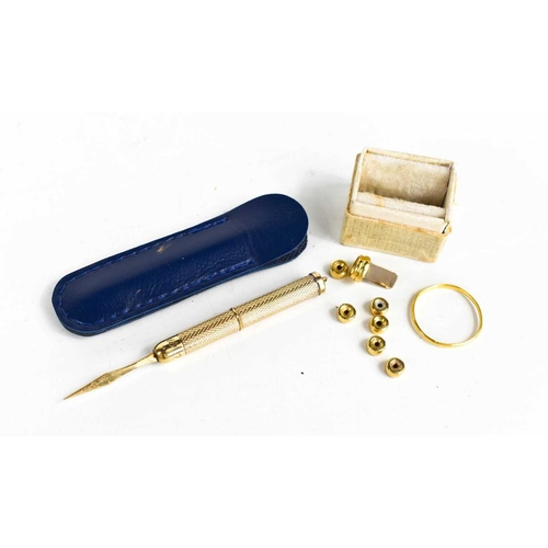 87 - A 9ct gold propelling toothpick, engine turned decoration, engraved with the date 10.7.99, 6.39g a 2... 