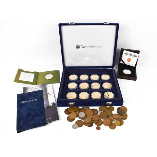 95 - A selection of coins to include a set of twelve The Centenary of the First World War Commemorative C... 