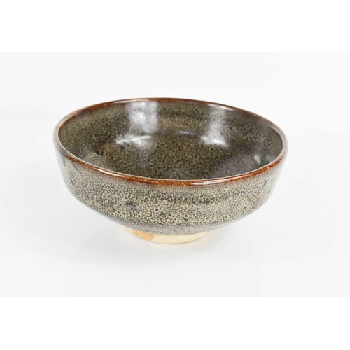 10 - A Chinese stone-ware mottled glaze bowl, with impressed mark to base, 15cm diameter.