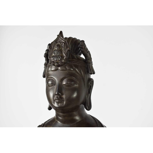 113 - A bronze statue of standing Bodhisattva, raised on a lotus form base, signed verso, 69cm high.