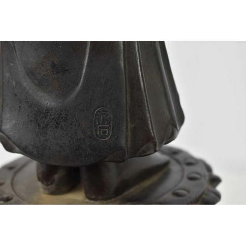 113 - A bronze statue of standing Bodhisattva, raised on a lotus form base, signed verso, 69cm high.