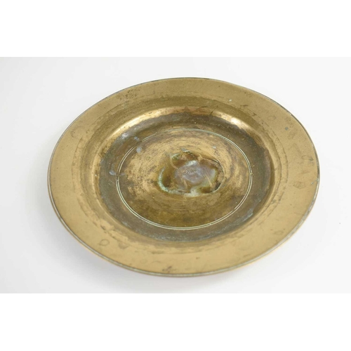 120 - A Chinese bronze dish, with concentric ring decoration to the inner and outer rims, 20cm diameter.