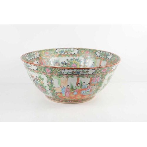 15 - A large 20th century Canton Famille Rose bowl, decorated throughout with reserves depicting interior... 