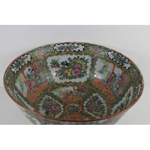 15 - A large 20th century Canton Famille Rose bowl, decorated throughout with reserves depicting interior... 