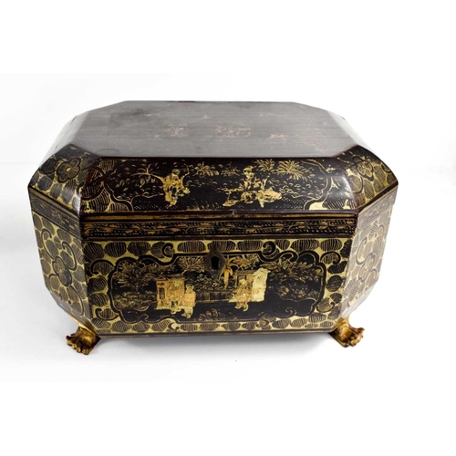 159 - A 19th century black lacquered Chinoiserie decorated tea caddy, with two pewter interior canister li... 