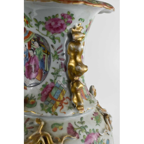 17 - A 19th century Chinese vase, modelled with gilded salamander to the body, dogs of fo to the neck, an... 