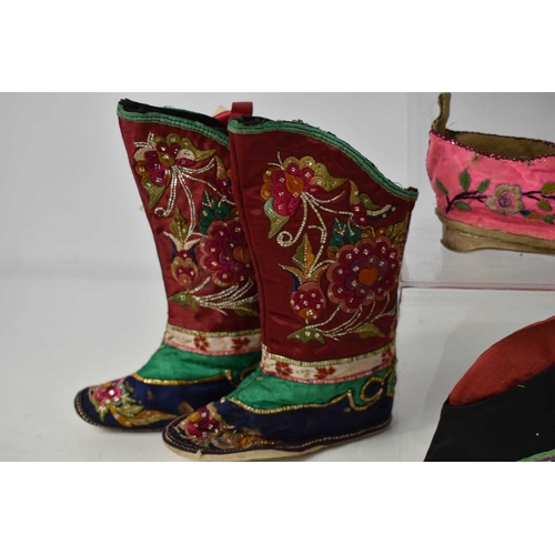 189 - A pair of Chinese boys celebratory boots, hand embroidered, together with three pairs of Chinese 19t... 