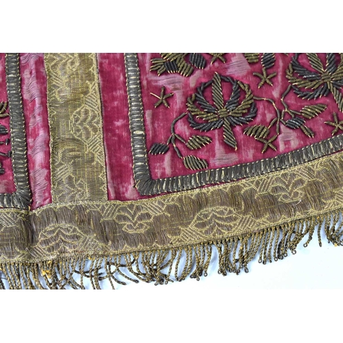 197 - A silk, embroidered altar cloth centrepiece, likely Judaic, the red silk ground embroidered with a d... 