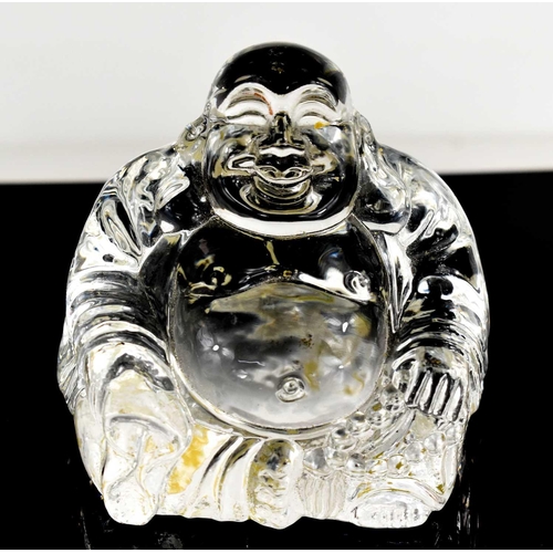 23 - A Chinese crystal seated Buddha, 9cm high.