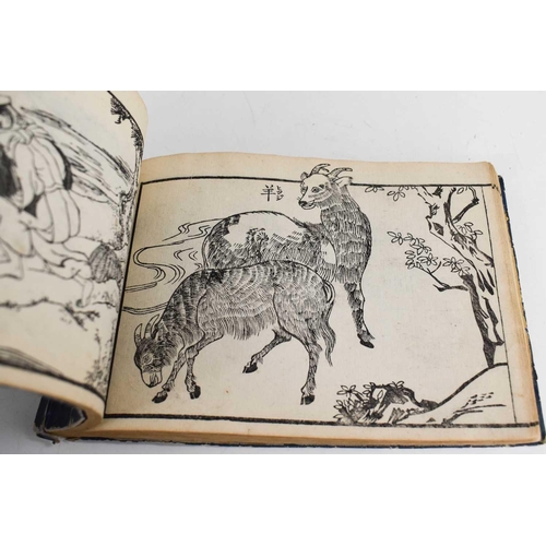 244 - A Chinese book, circa 1900, printed to depict various animals.