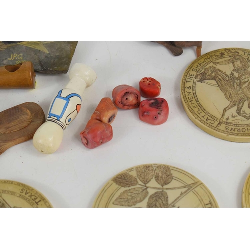 282 - A set of four Scrimshaw bone coasters depicting the history of Texas USA together with a carved wood... 