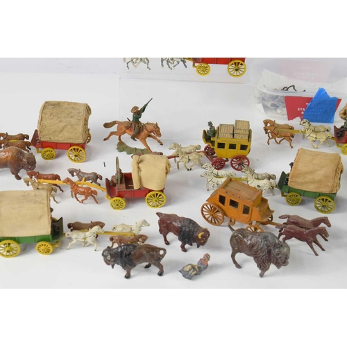 283 - A group of vintage diecast covered wagons and stagecoaches with horses, possibly made by Moorestone ... 