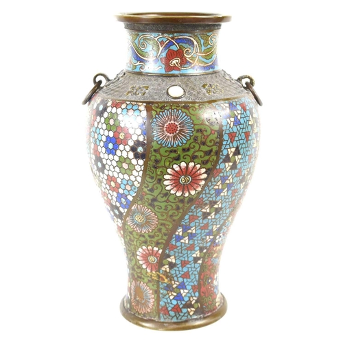 29 - A Chinese bronze cloisonne vase with ring handles, decorated in polychrome lotus scrolls and flowers... 