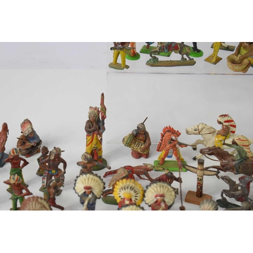 372 - A collection of diecast, lead and composition Native American figures and animals to include example... 