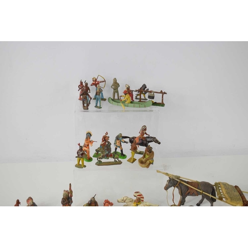 372 - A collection of diecast, lead and composition Native American figures and animals to include example... 