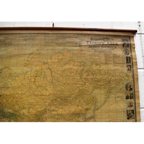 378 - A Scarborough's double sided map of the world, depicting North and South America on one side and Eur... 