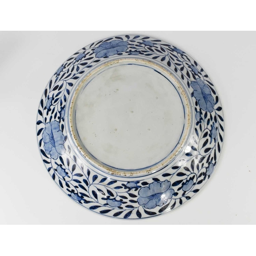 4 - A Chinese Qing Dynasty Imari charger, with central circular section painted with a phoenix in a tree... 