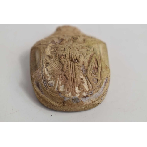 415 - An antique Egyptian stone carved scarab beetle, the base carved with six lines of hieroglyphs, 4cm b... 