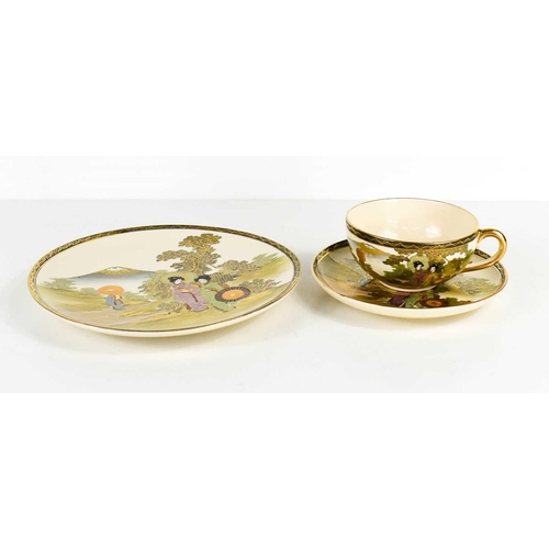 46 - A Qing Dynasty Japanese trio; cup, saucer and cake plate, decorated with figures in landscape with M... 