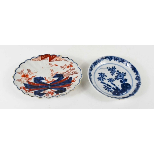 52 - A blue and white saucer, or pin dish, likely 18th century Qing Dynasty, 12cm diameter and a small lo... 