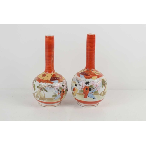 54 - A pair of Japanese Satsuma ware bottle vases, decorated with figures amongst landscapes, with fans a... 