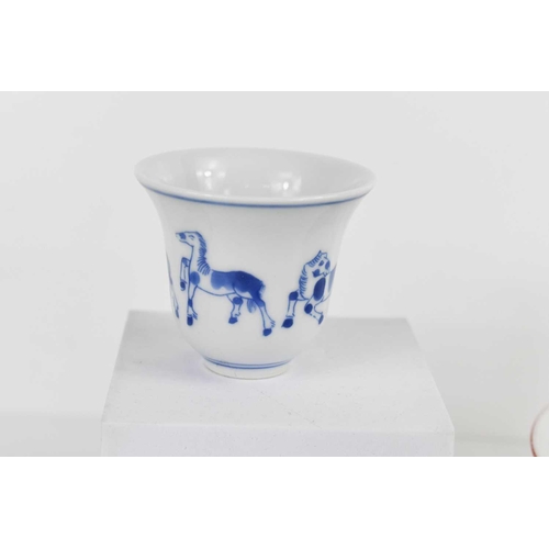 95 - A group of Chinese ceramics, comprising a blue and white jar and cover, decorated with four horses t... 