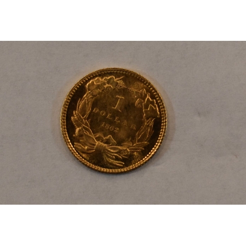 65 - A USA gold dollar dated 1862.