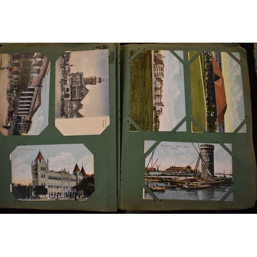 28 - An early 20th century postcard album, the vast majority are of India together with some military rel... 