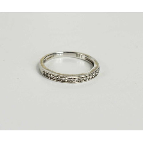 128 - A 9ct white gold and diamond half eternity ring set with sixteen small diamonds, size L, 1.86g.