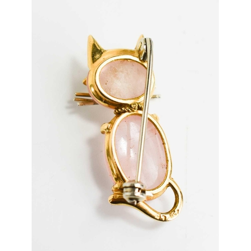 14 - A vintage 18ct gold and rose quartz cat brooch, formed from two cabochon rose quartz stones with gol... 