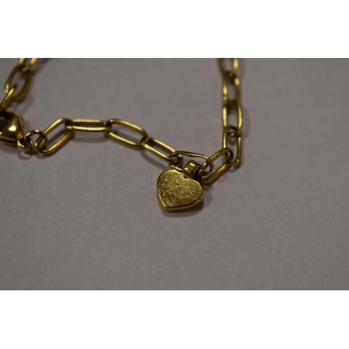 168 - An 18ct gold bracelet composed of elongated oval links, and having a heart charm, 11.46g. The piece ... 