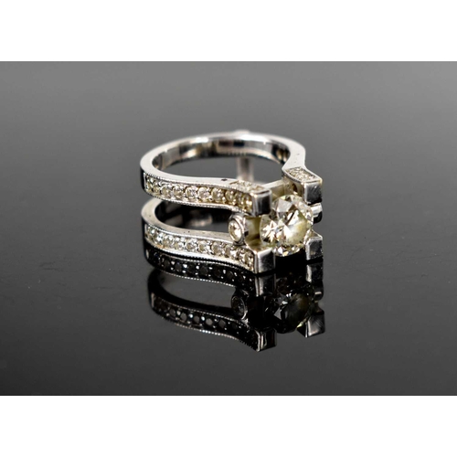 184 - A 14ct white gold and diamond dress ring, set with central stone of approximately 1.5ct, 7.4mm diame... 