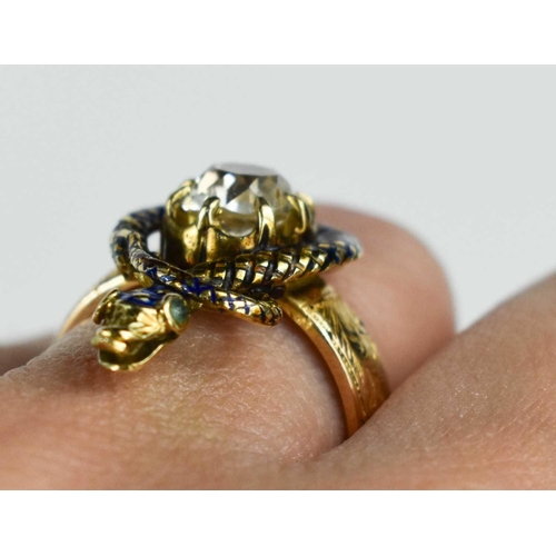 185 - An early 19th century 18ct gold, enamel and diamond snake form ring, the snake coils round with blue... 