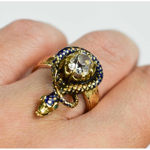 185 - An early 19th century 18ct gold, enamel and diamond snake form ring, the snake coils round with blue... 