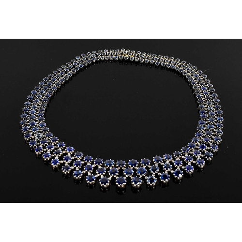 187 - A stunning 18ct white gold, sapphire, and diamond résille collar necklace by Pragnell, showcasing 89... 